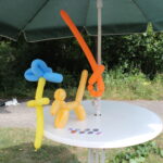 Luftballons und Ansteckbuttons